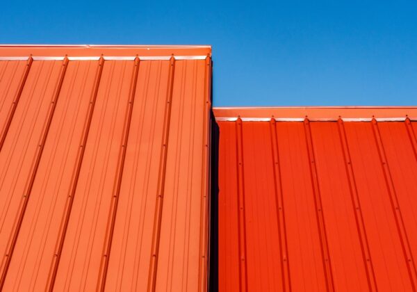 brown wooden wall under blue sky during daytime